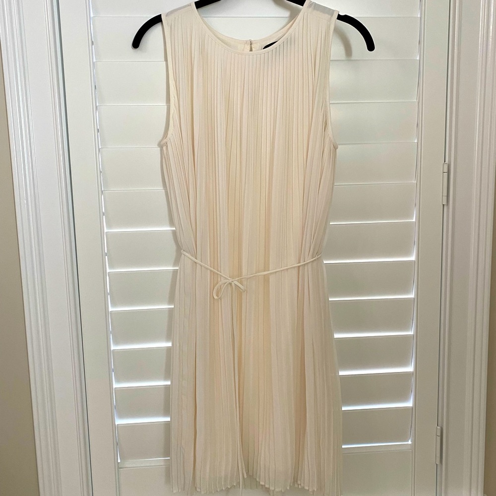 White pleated cocktail dress